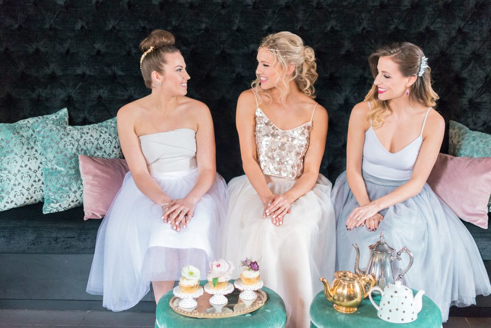 Three guests at a styled bridal tea