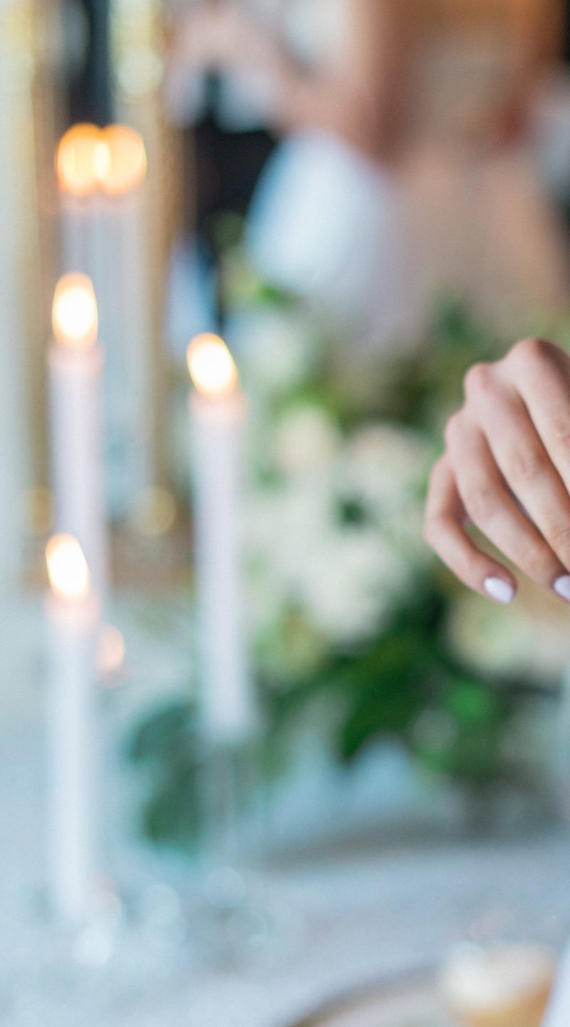 Taper candles and white florals