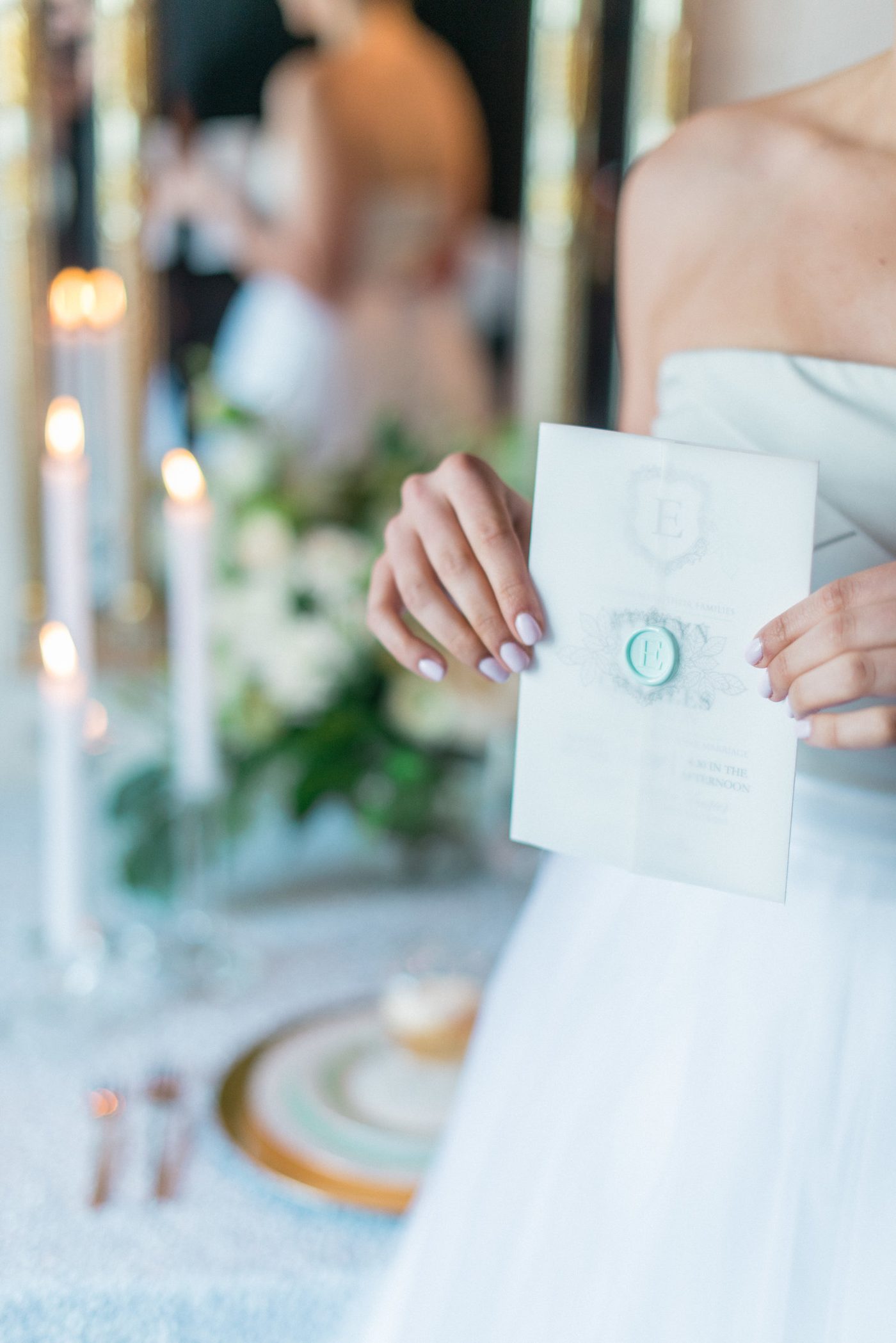 A styled wedding invitation detail